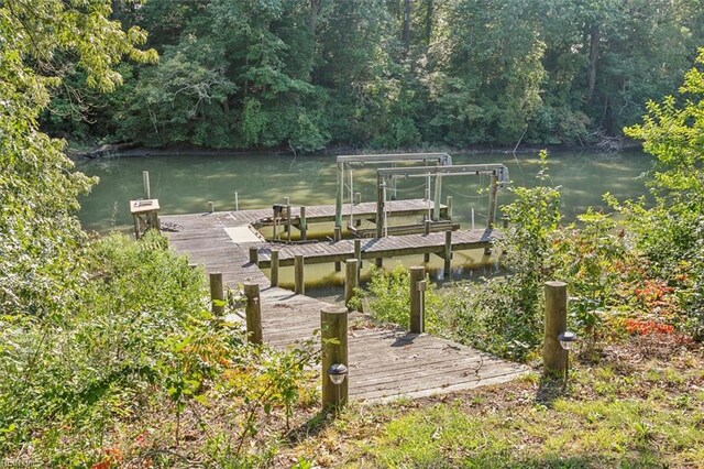 view of dock with a water view