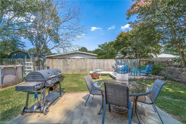 view of patio with a grill