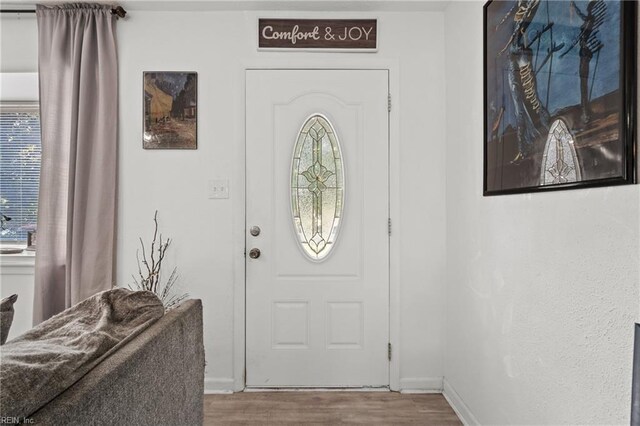 interior space with hardwood / wood-style flooring