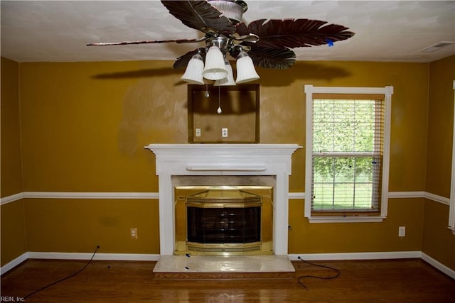 6703 Chambers Ln, Suffolk, VA 23435 - unfurnished living room with ceiling fan, a glass covered fireplace, baseboards, wood finished floors, and visible vents