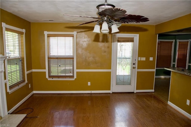 6703 Chambers Ln, Suffolk, VA 23435 - interior space featuring baseboards, a ceiling fan, plenty of natural light, and wood finished floors