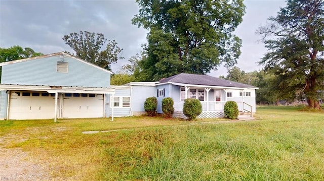 view of front of home featuring a garage and a front lawn