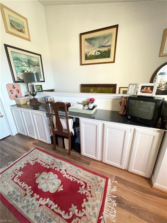 home office featuring light hardwood / wood-style floors