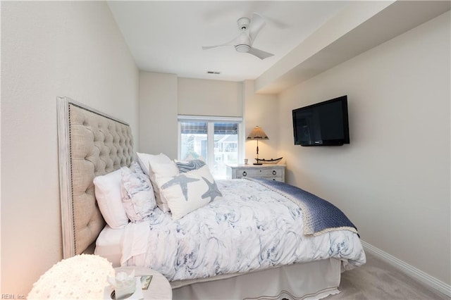 bedroom featuring ceiling fan and carpet floors