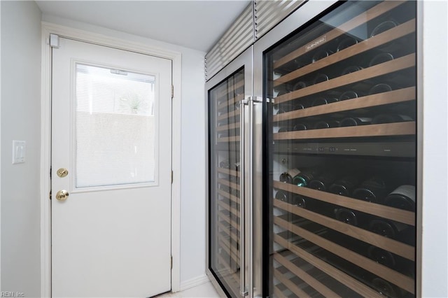 doorway featuring beverage cooler