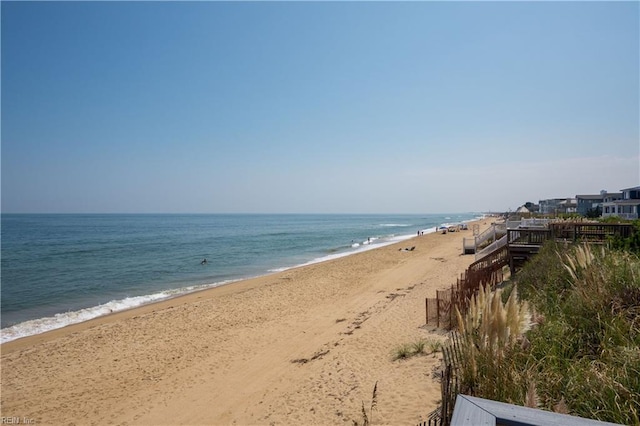 property view of water featuring a beach view