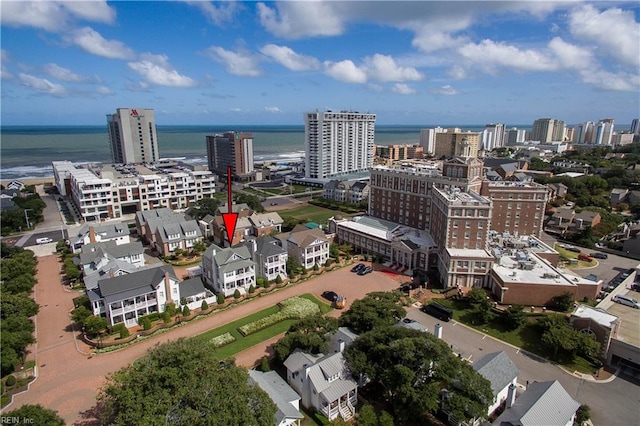 drone / aerial view with a water view