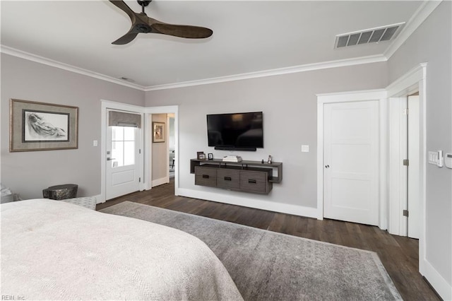 bedroom with crown molding, dark wood-type flooring, and ceiling fan