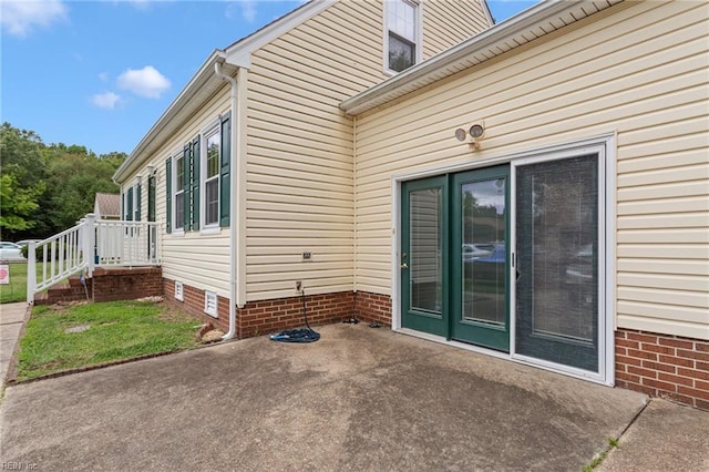 view of home's exterior with a patio area