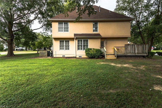 back of property featuring stucco siding, a lawn, cooling unit, a wooden deck, and crawl space