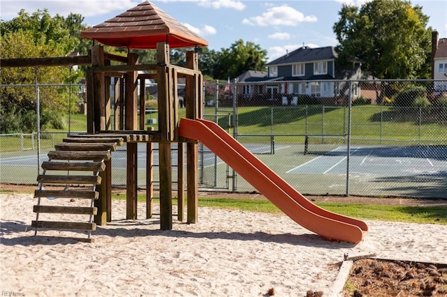 community jungle gym with fence