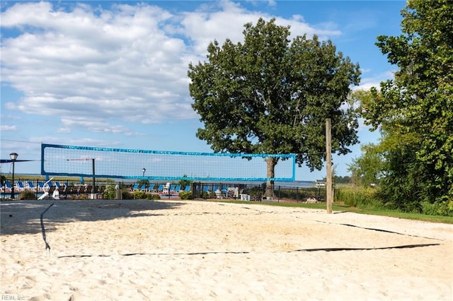 view of home's community featuring volleyball court