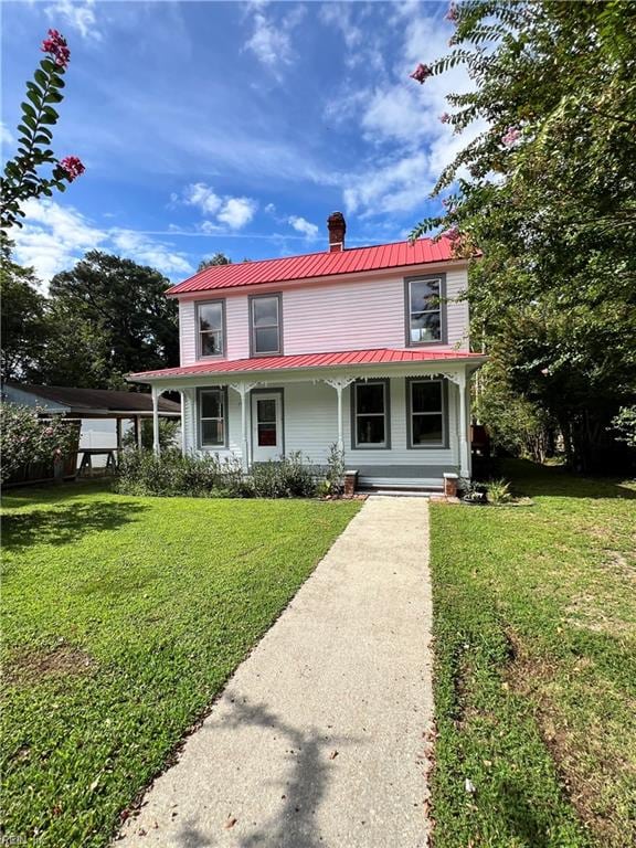 view of front of home featuring a porch and a front lawn