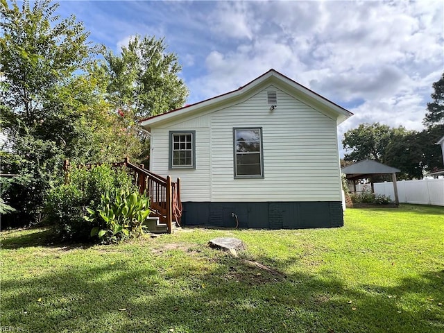 exterior space with a lawn