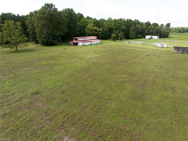 view of yard with a rural view