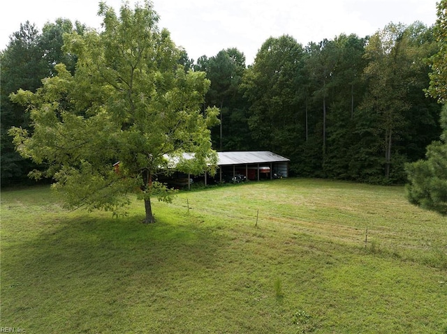 view of yard with a rural view