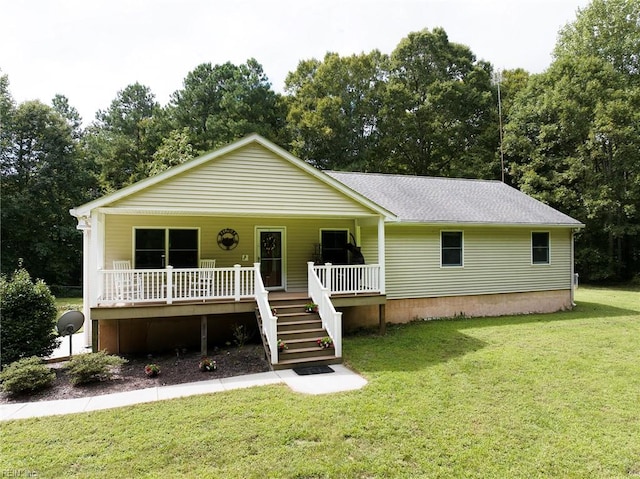 view of front of property with a front yard and a porch