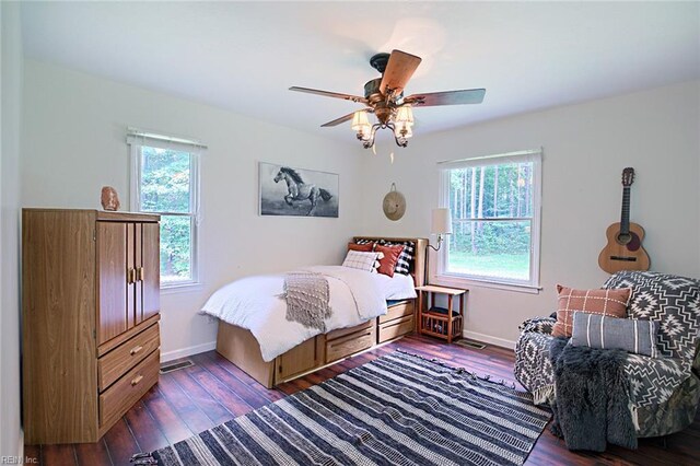 bedroom with a closet, ceiling fan, and light hardwood / wood-style flooring