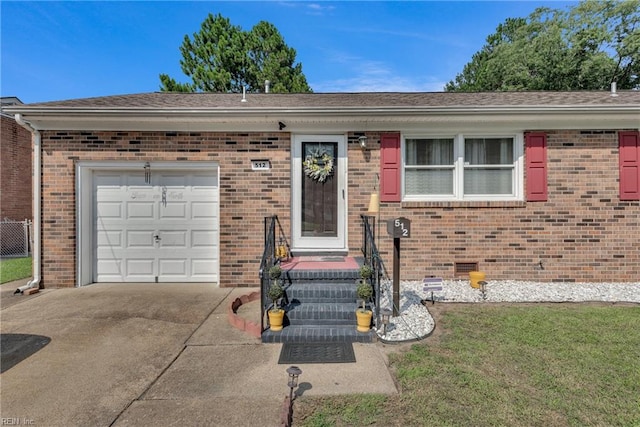 single story home with a garage and a front yard