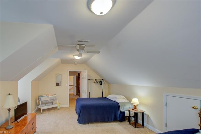 carpeted bedroom with lofted ceiling and ceiling fan