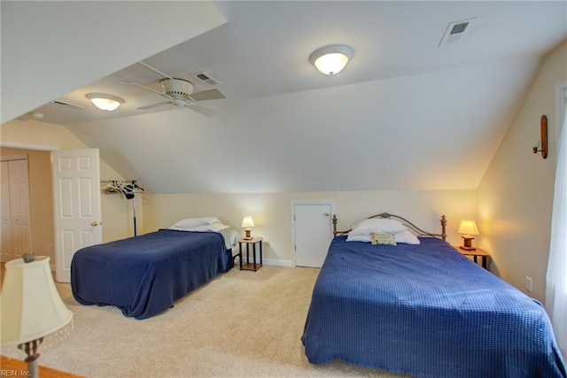 bedroom featuring vaulted ceiling, ceiling fan, and carpet