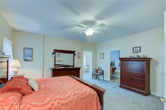 bedroom featuring ceiling fan and light carpet