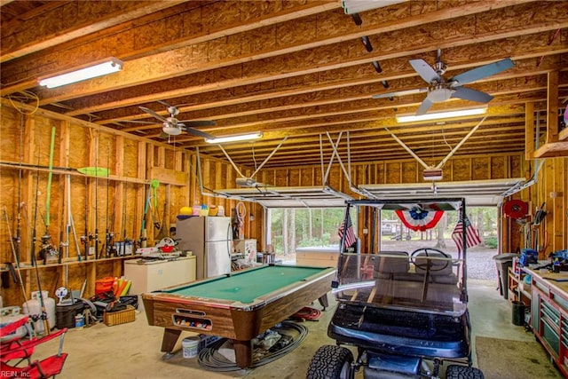 interior space with billiards, concrete floors, and ceiling fan