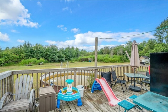 wooden deck with a yard