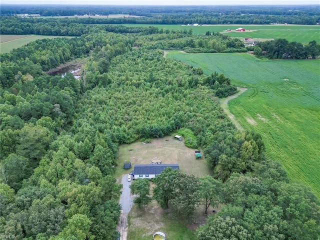 birds eye view of property with a rural view