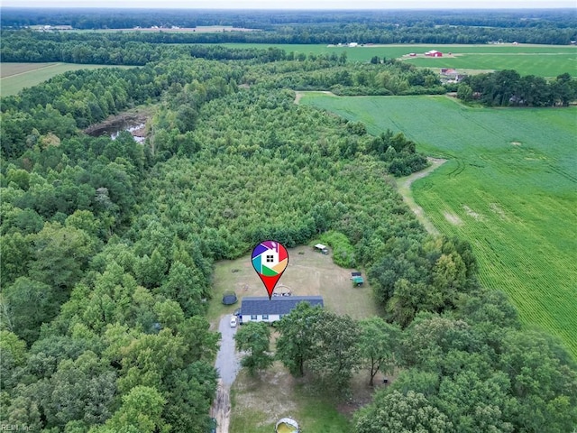 birds eye view of property featuring a rural view