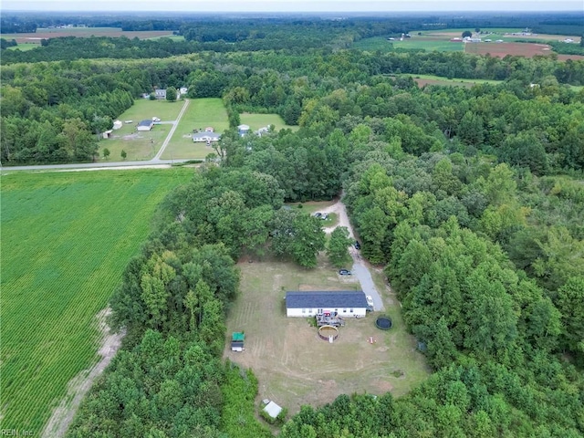 bird's eye view featuring a rural view and a forest view