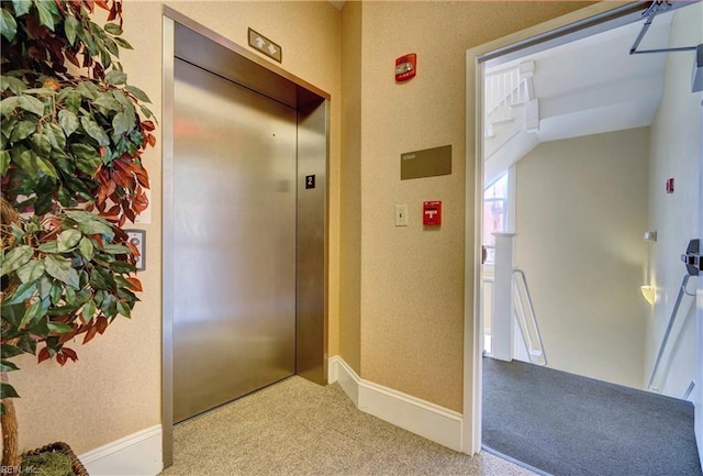 hallway with elevator