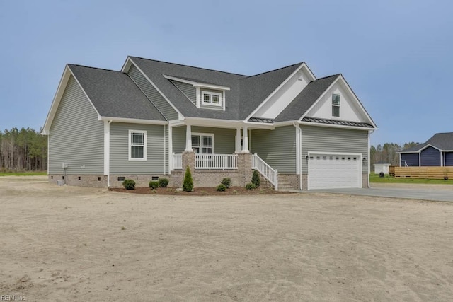 craftsman-style home with a garage and a porch