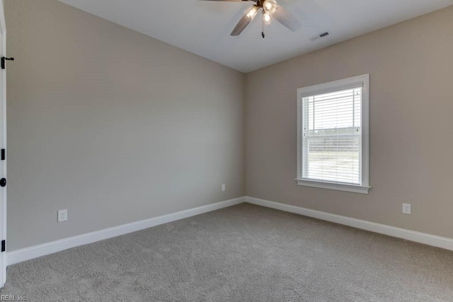 carpeted empty room with ceiling fan