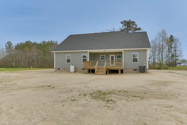 back of property featuring central AC and a wooden deck