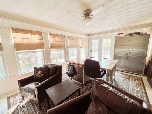 tiled office space with ceiling fan, a wealth of natural light, and ornamental molding