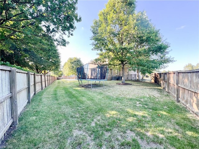 view of yard with a trampoline