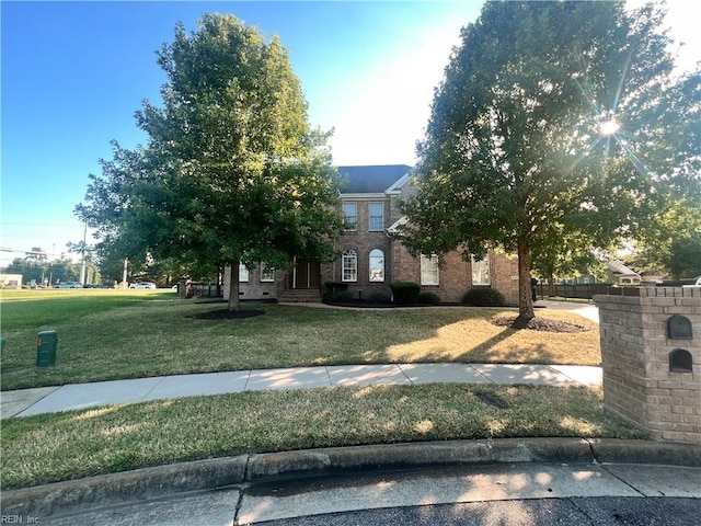 view of front of house with a front lawn