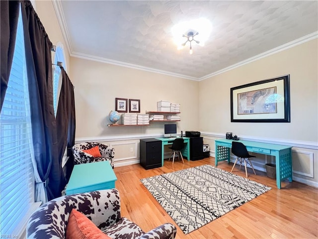 home office with ornamental molding, a textured ceiling, and light hardwood / wood-style flooring