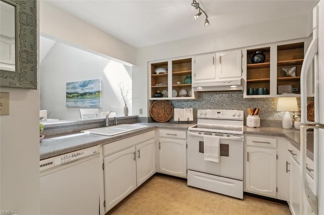 kitchen featuring track lighting, white appliances, backsplash, sink, and white cabinets