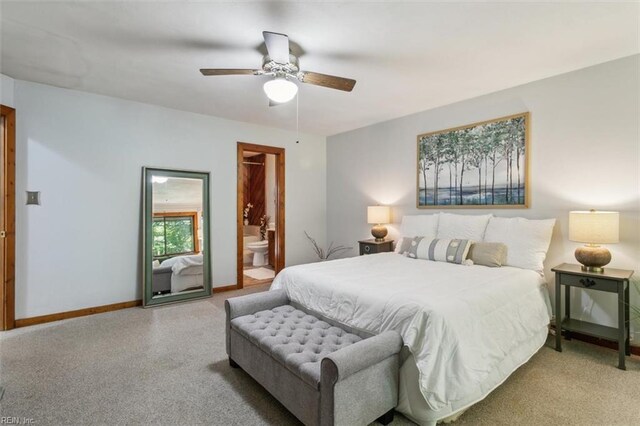 bedroom featuring ceiling fan and connected bathroom