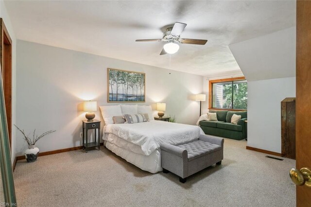 carpeted bedroom featuring ceiling fan