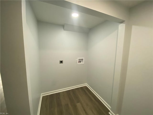 washroom with hookup for an electric dryer, dark hardwood / wood-style floors, and washer hookup