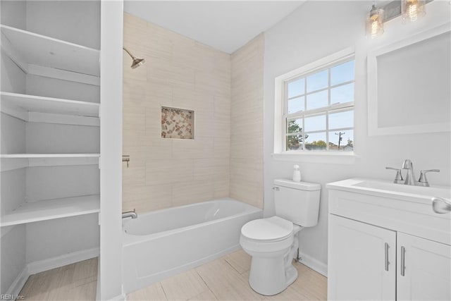 full bathroom featuring vanity, toilet, tile patterned flooring, and tiled shower / bath