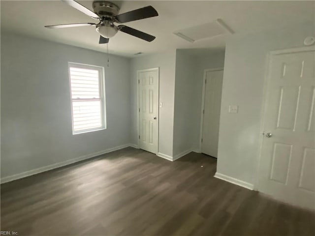 unfurnished bedroom with a closet, ceiling fan, and dark hardwood / wood-style flooring