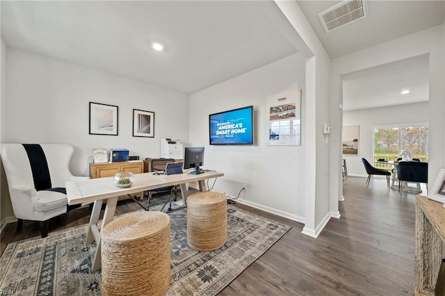 home office featuring dark hardwood / wood-style flooring