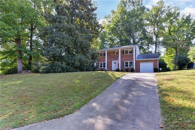 view of front facade featuring a garage and a front lawn