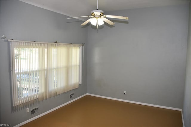 empty room featuring ceiling fan and a healthy amount of sunlight