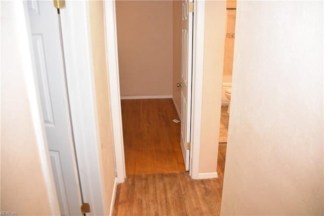 hallway featuring light hardwood / wood-style flooring