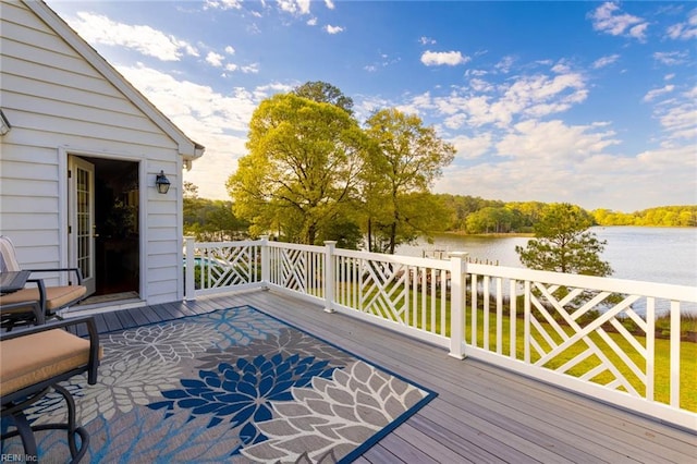 deck featuring a water view